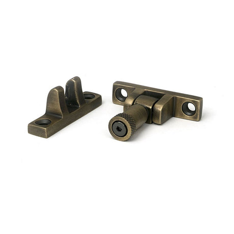 High quality images of the From The Anvil - Burnished Brass Brompton Brighton Fastener - Narrow (Square) | Sku. Anvil-52349 | available to order from Trade Door Handles, quick delivery at discounted prices.