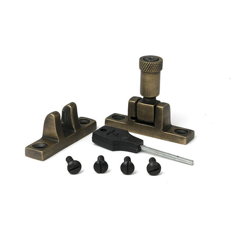 High quality images of the From The Anvil - Burnished Brass Brompton Brighton Fastener - Narrow (Square) | Sku. Anvil-52349 | available to order from Trade Door Handles, quick delivery at discounted prices.