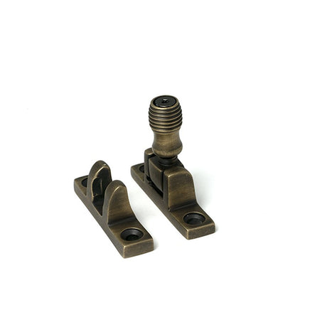 High quality images of the From The Anvil - Burnished Brass Beehive Brighton Fastener - Narrow (Square) | Sku. Anvil-52351 | available to order from Trade Door Handles, quick delivery at discounted prices.