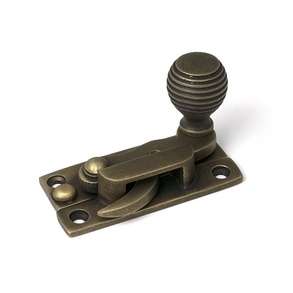 High quality images of the From The Anvil - Burnished Brass Beehive Sash Hook Fastener | Sku. Anvil-52365 | available to order from Trade Door Handles, quick delivery at discounted prices.