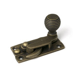 High quality images of the From The Anvil - Burnished Brass Beehive Sash Hook Fastener | Sku. Anvil-52365 | available to order from Trade Door Handles, quick delivery at discounted prices.