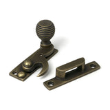 High quality images of the From The Anvil - Burnished Brass Beehive Sash Hook Fastener | Sku. Anvil-52365 | available to order from Trade Door Handles, quick delivery at discounted prices.