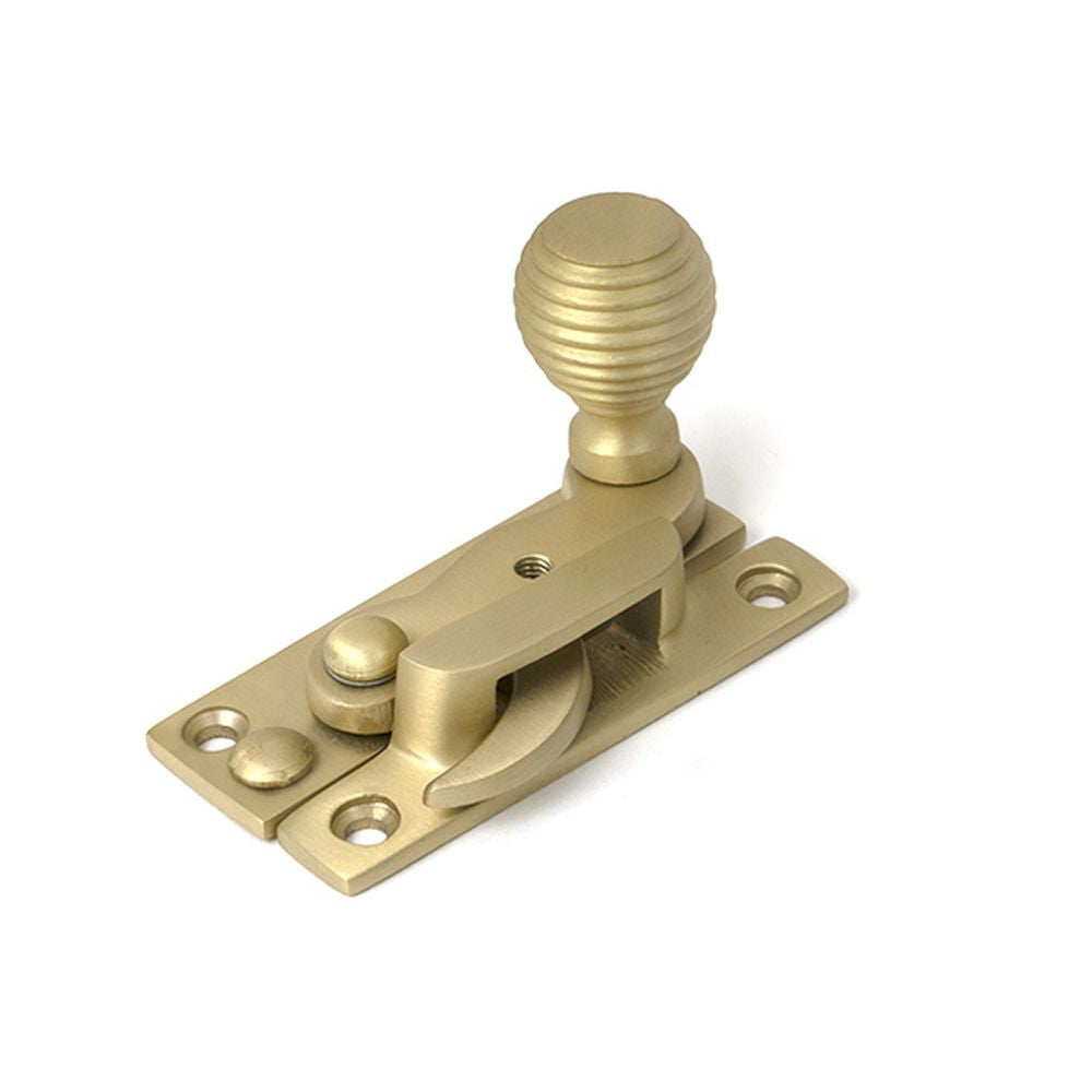 High quality images of the From The Anvil - Satin Brass Beehive Sash Hook Fastener | Sku. Anvil-52366 | available to order from Trade Door Handles, quick delivery at discounted prices.