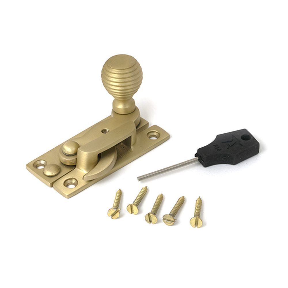 High quality images of the From The Anvil - Satin Brass Beehive Sash Hook Fastener | Sku. Anvil-52366 | available to order from Trade Door Handles, quick delivery at discounted prices.