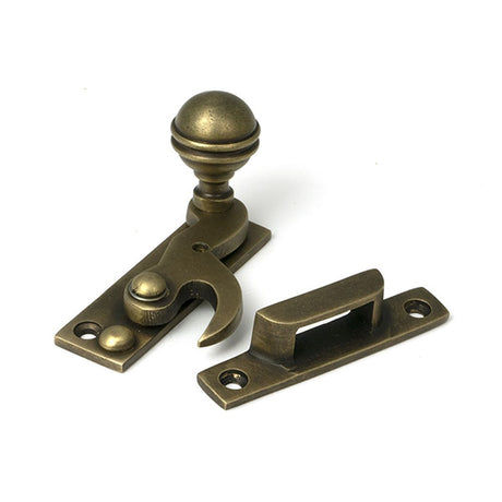 High quality images of the From The Anvil - Burnished Brass Prestbury Sash Hook Fastener | Sku. Anvil-52367 | available to order from Trade Door Handles, quick delivery at discounted prices.