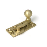 High quality images of the From The Anvil - Satin Brass Sash Hook Fastener | Sku. Anvil-52377 | available to order from Trade Door Handles, quick delivery at discounted prices.