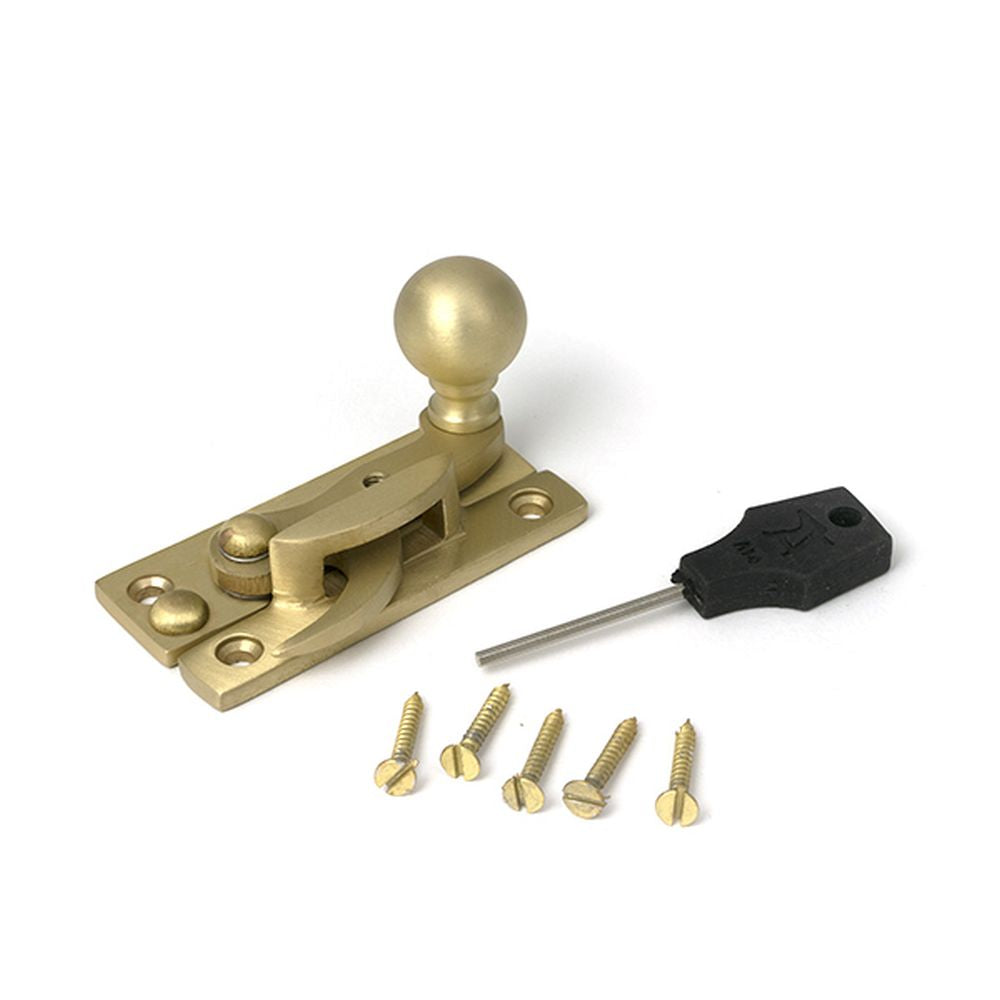 High quality images of the From The Anvil - Satin Brass Sash Hook Fastener | Sku. Anvil-52377 | available to order from Trade Door Handles, quick delivery at discounted prices.