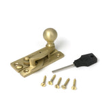 High quality images of the From The Anvil - Satin Brass Sash Hook Fastener | Sku. Anvil-52377 | available to order from Trade Door Handles, quick delivery at discounted prices.