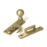High quality images of the From The Anvil - Satin Brass Sash Hook Fastener | Sku. Anvil-52377 | available to order from Trade Door Handles, quick delivery at discounted prices.