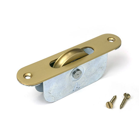 High quality images of the From The Anvil - Satin Brass Radiused Sash Pulley 75kg | Sku. Anvil-52398 | available to order from Trade Door Handles, quick delivery at discounted prices.