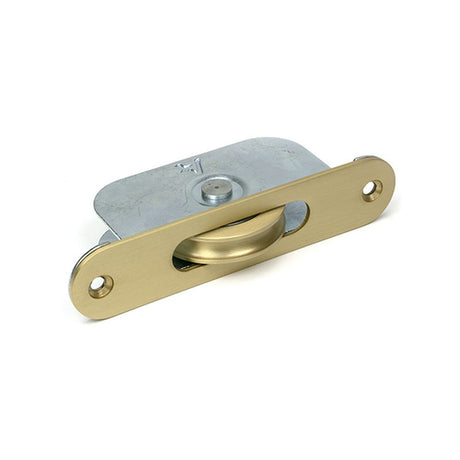 High quality images of the From The Anvil - Satin Brass Radiused Sash Pulley 75kg | Sku. Anvil-52398 | available to order from Trade Door Handles, quick delivery at discounted prices.