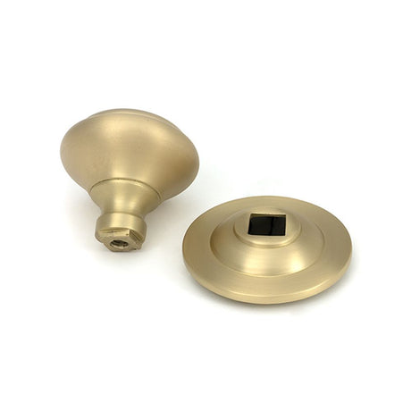 High quality images of the From The Anvil - Satin Brass Round Centre Door Knob | Sku. Anvil-52405 | available to order from Trade Door Handles, quick delivery at discounted prices.