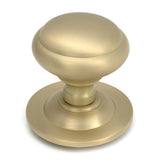 High quality images of the From The Anvil - Satin Brass Round Centre Door Knob | Sku. Anvil-52405 | available to order from Trade Door Handles, quick delivery at discounted prices.