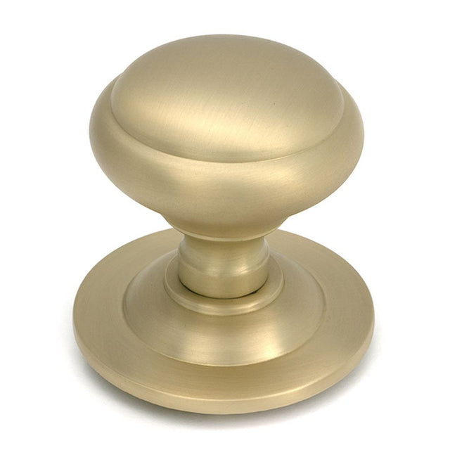 High quality images of the From The Anvil - Satin Brass Round Centre Door Knob | Sku. Anvil-52405 | available to order from Trade Door Handles, quick delivery at discounted prices.