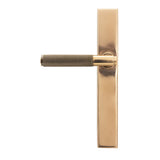 High quality images of the From The Anvil - Polished Bronze Brompton Slimline Lever Espag. Latch Set | Sku. Anvil-52417 | available to order from Trade Door Handles, quick delivery at discounted prices.