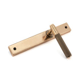 High quality images of the From The Anvil - Polished Bronze Brompton Slimline Lever Espag. Latch Set | Sku. Anvil-52417 | available to order from Trade Door Handles, quick delivery at discounted prices.
