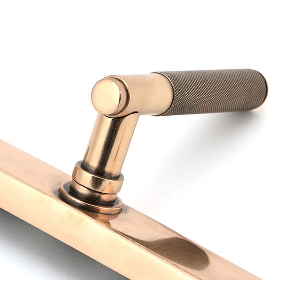 High quality images of the From The Anvil - Polished Bronze Brompton Slimline Lever Espag. Latch Set | Sku. Anvil-52417 | available to order from Trade Door Handles, quick delivery at discounted prices.