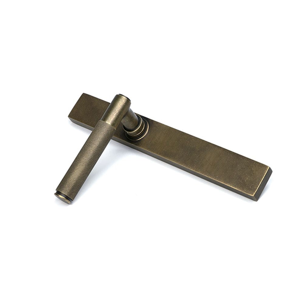 High quality images of the From The Anvil - Burnished Brass Brompton Slimline Lever Espag. Latch Set | Sku. Anvil-52418 | available to order from Trade Door Handles, quick delivery at discounted prices.