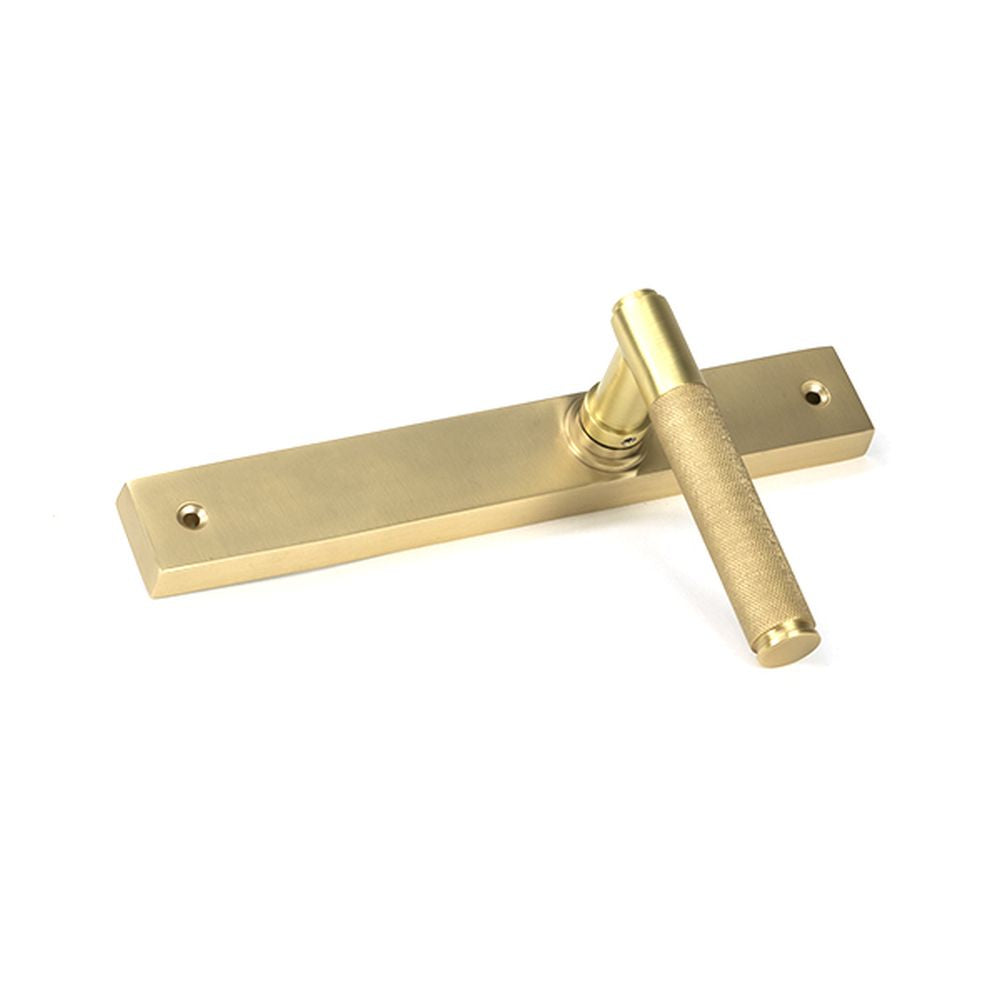 High quality images of the From The Anvil - Satin Brass Brompton Slimline Lever Espag. Latch Set | Sku. Anvil-52419 | available to order from Trade Door Handles, quick delivery at discounted prices.