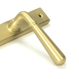 High quality images of the From The Anvil - Satin Brass Newbury Slimline Lever Espag. Latch Set | Sku. Anvil-52422 | available to order from Trade Door Handles, quick delivery at discounted prices.