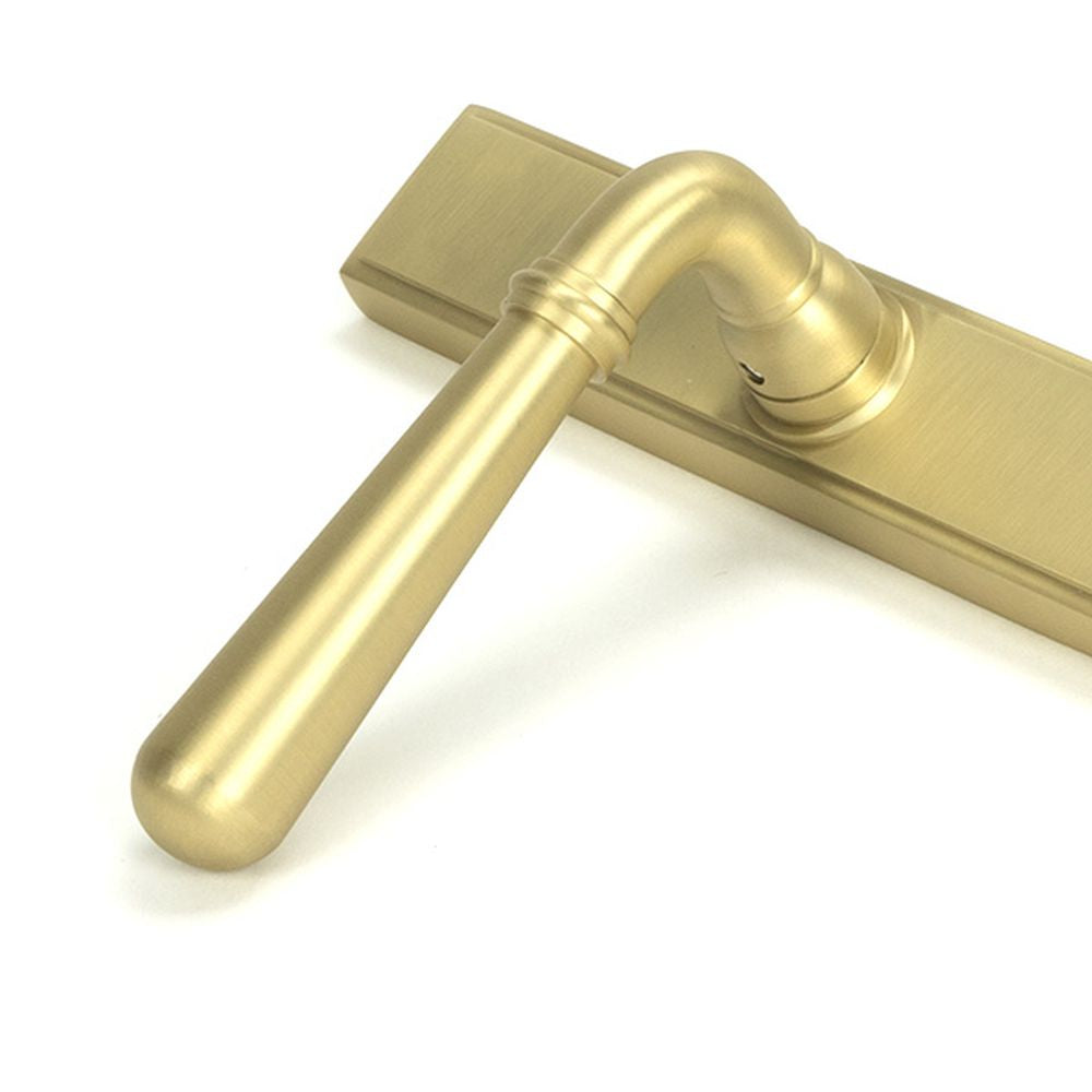 High quality images of the From The Anvil - Satin Brass Newbury Slimline Lever Espag. Latch Set | Sku. Anvil-52422 | available to order from Trade Door Handles, quick delivery at discounted prices.