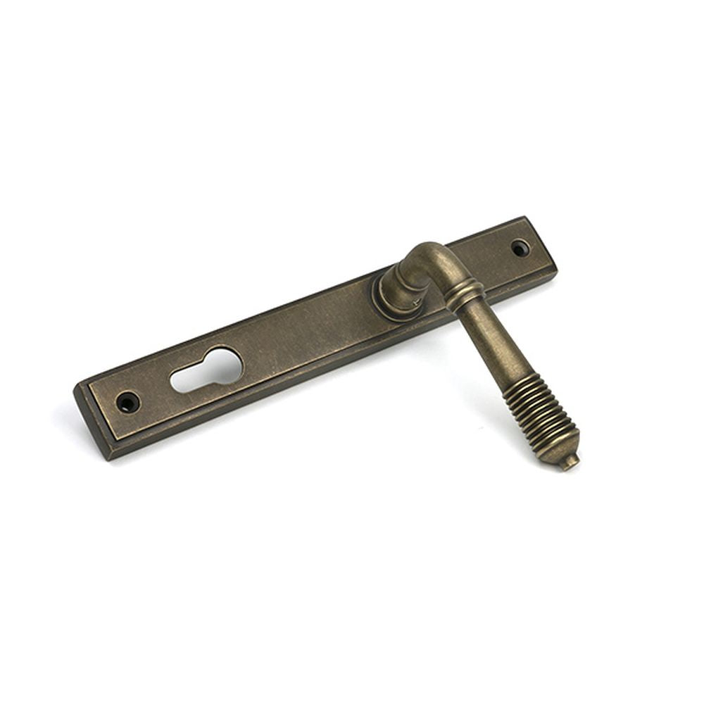 High quality images of the From The Anvil - Burnished Brass Reeded Slimline Lever Espag. Lock Set | Sku. Anvil-52423 | available to order from Trade Door Handles, quick delivery at discounted prices.