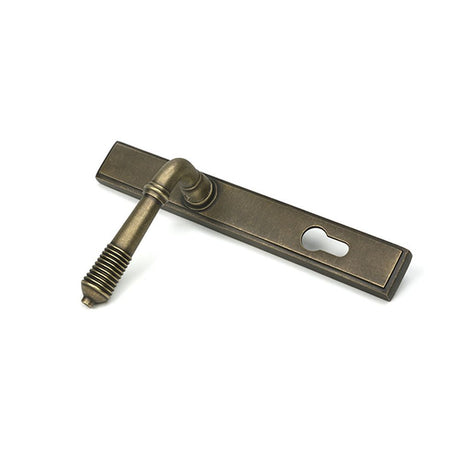 High quality images of the From The Anvil - Burnished Brass Reeded Slimline Lever Espag. Lock Set | Sku. Anvil-52423 | available to order from Trade Door Handles, quick delivery at discounted prices.