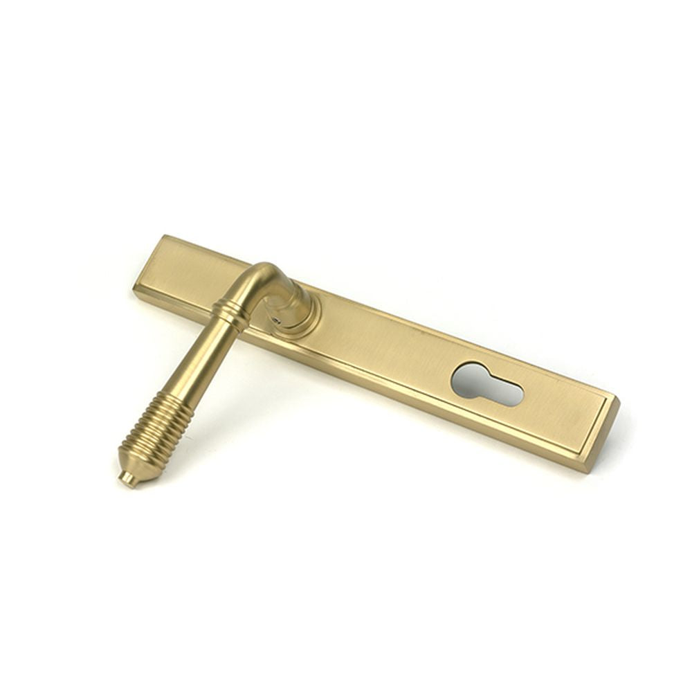 High quality images of the From The Anvil - Satin Brass Reeded Slimline Lever Espag. Lock Set | Sku. Anvil-52424 | available to order from Trade Door Handles, quick delivery at discounted prices.