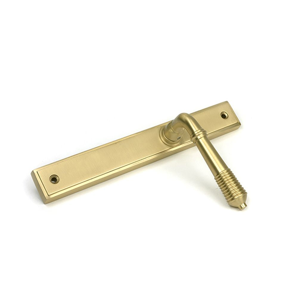 High quality images of the From The Anvil - Satin Brass Reeded Slimline Lever Latch Set | Sku. Anvil-52427 | available to order from Trade Door Handles, quick delivery at discounted prices.