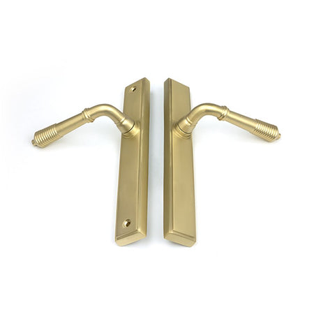 High quality images of the From The Anvil - Satin Brass Reeded Slimline Lever Latch Set | Sku. Anvil-52427 | available to order from Trade Door Handles, quick delivery at discounted prices.
