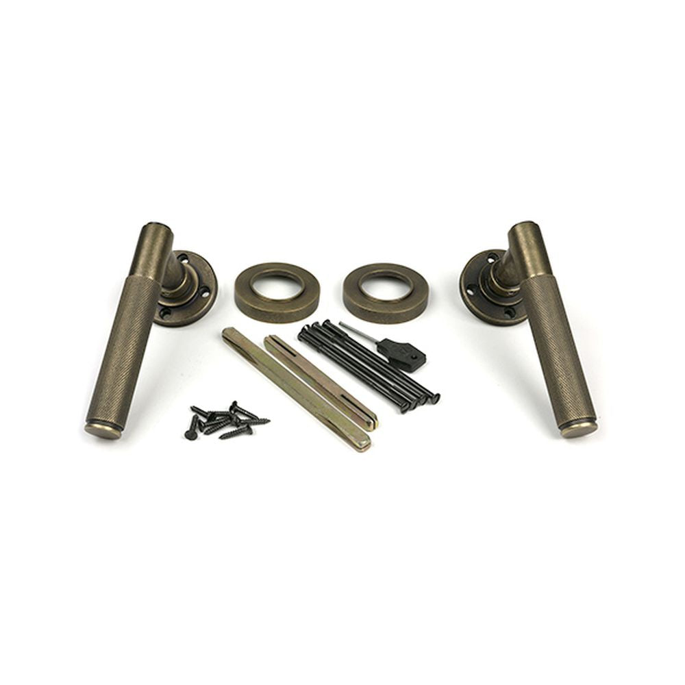 High quality images of the From The Anvil - Burnished Brass Brompton Lever on Rose Set (Plain) | Sku. Anvil-52433 | available to order from Trade Door Handles, quick delivery at discounted prices.