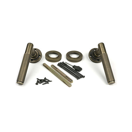 High quality images of the From The Anvil - Burnished Brass Brompton Lever on Rose Set (Plain) | Sku. Anvil-52433 | available to order from Trade Door Handles, quick delivery at discounted prices.