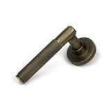 High quality images of the From The Anvil - Burnished Brass Brompton Lever on Rose Set (Plain) | Sku. Anvil-52433 | available to order from Trade Door Handles, quick delivery at discounted prices.