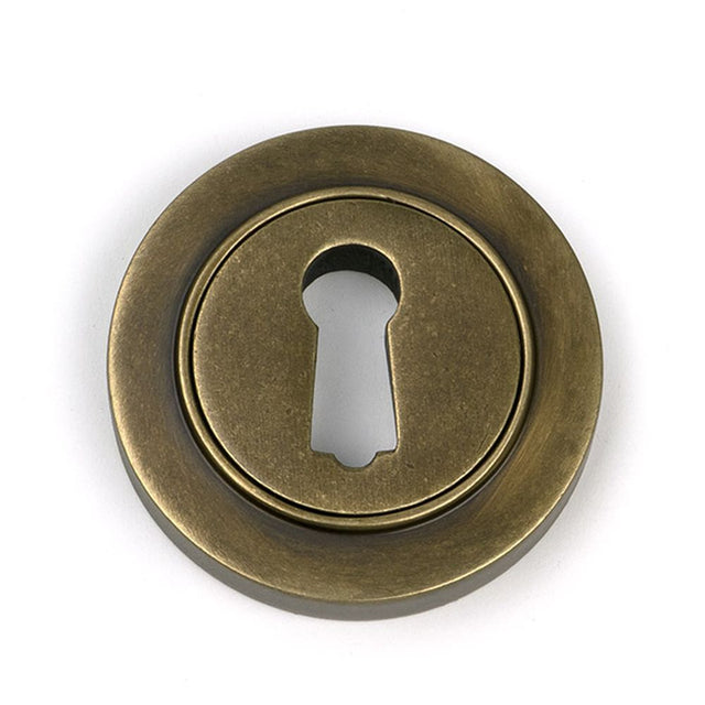 High quality images of the From The Anvil - Burnished Brass Round Escutcheon (Plain) | Sku. Anvil-52443 | available to order from Trade Door Handles, quick delivery at discounted prices.