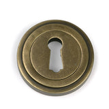High quality images of the From The Anvil - Burnished Brass Round Escutcheon (Art Deco) | Sku. Anvil-52444 | available to order from Trade Door Handles, quick delivery at discounted prices.