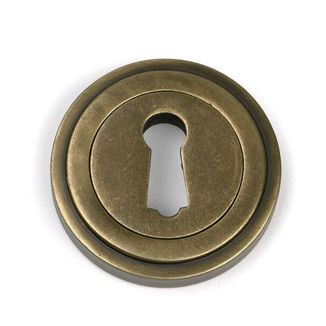 High quality images of the From The Anvil - Burnished Brass Round Escutcheon (Art Deco) | Sku. Anvil-52444 | available to order from Trade Door Handles, quick delivery at discounted prices.