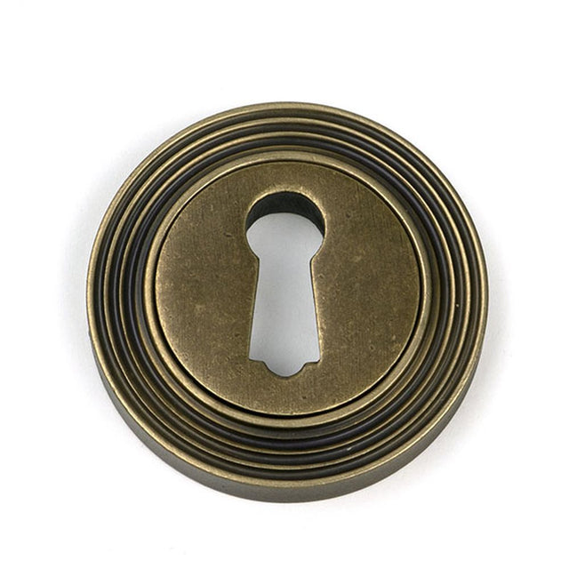 High quality images of the From The Anvil - Burnished Brass Round Escutcheon (Beehive) | Sku. Anvil-52445 | available to order from Trade Door Handles, quick delivery at discounted prices.