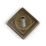 High quality images of the From The Anvil - Burnished Brass Round Escutcheon (Square) | Sku. Anvil-52446 | available to order from Trade Door Handles, quick delivery at discounted prices.