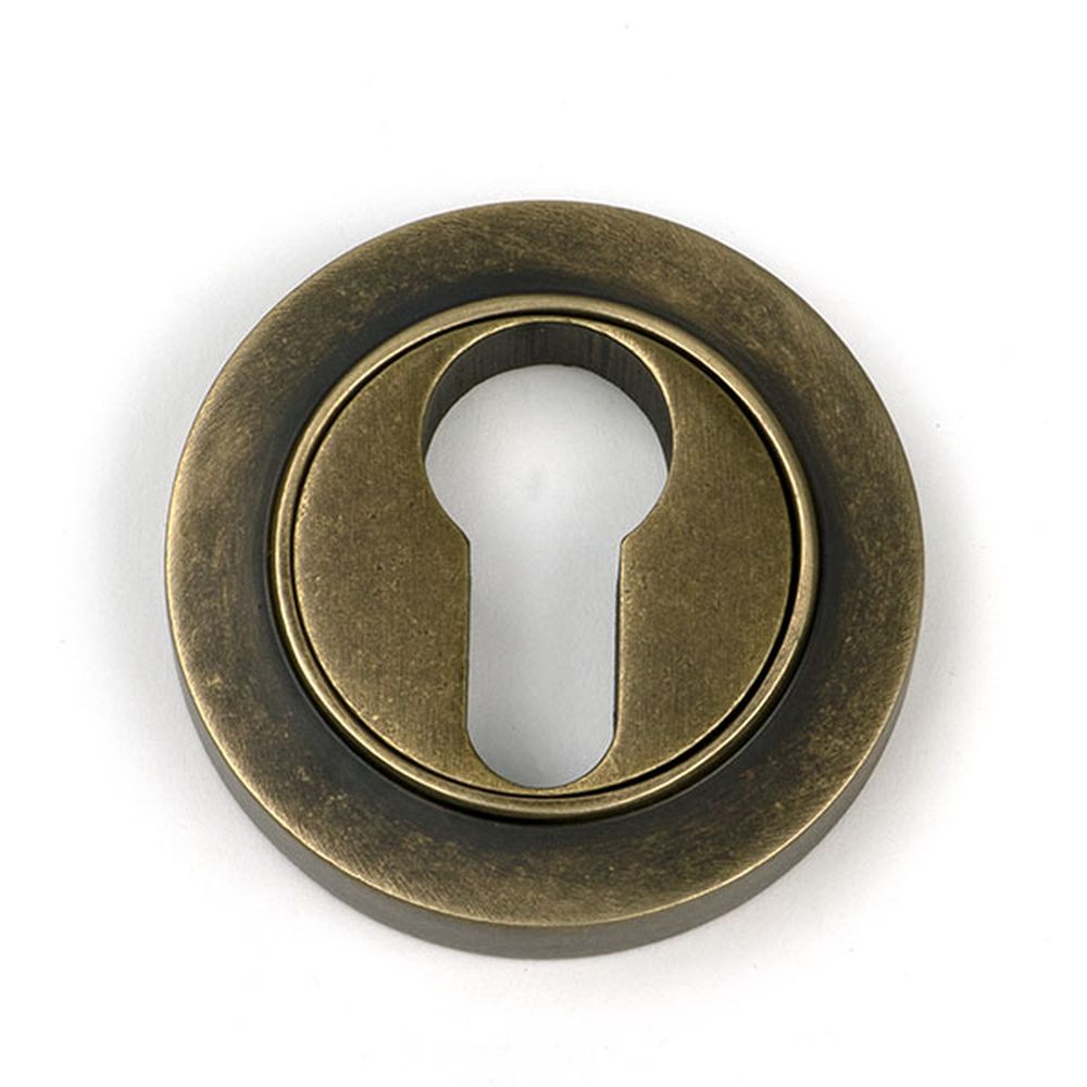 High quality images of the From The Anvil - Burnished Brass Round Euro Escutcheon (Plain) | Sku. Anvil-52447 | available to order from Trade Door Handles, quick delivery at discounted prices.