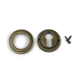 High quality images of the From The Anvil - Burnished Brass Round Euro Escutcheon (Art Deco) | Sku. Anvil-52448 | available to order from Trade Door Handles, quick delivery at discounted prices.
