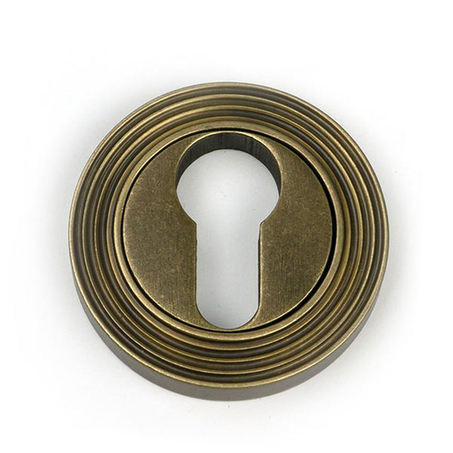 High quality images of the From The Anvil - Burnished Brass Round Euro Escutcheon (Beehive) | Sku. Anvil-52449 | available to order from Trade Door Handles, quick delivery at discounted prices.