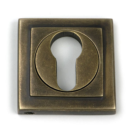 High quality images of the From The Anvil - Burnished Brass Round Euro Escutcheon (Square) | Sku. Anvil-52450 | available to order from Trade Door Handles, quick delivery at discounted prices.