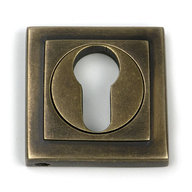 High quality images of the From The Anvil - Burnished Brass Round Euro Escutcheon (Square) | Sku. Anvil-52450 | available to order from Trade Door Handles, quick delivery at discounted prices.