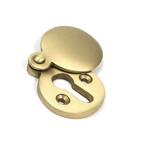 High quality images of the From The Anvil - Satin Brass 30mm Round Escutcheon | Sku. Anvil-52452 | available to order from Trade Door Handles, quick delivery at discounted prices.