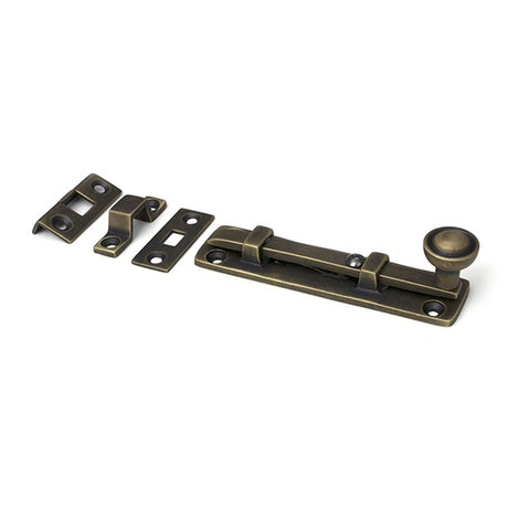 High quality images of the From The Anvil - Burnished Brass 4" Universal Bolt | Sku. Anvil-52459 | available to order from Trade Door Handles, quick delivery at discounted prices.