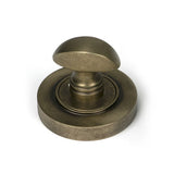 High quality images of the From The Anvil - Burnished Brass Round Thumbturn Set (Plain) | Sku. Anvil-52464 | available to order from Trade Door Handles, quick delivery at discounted prices.