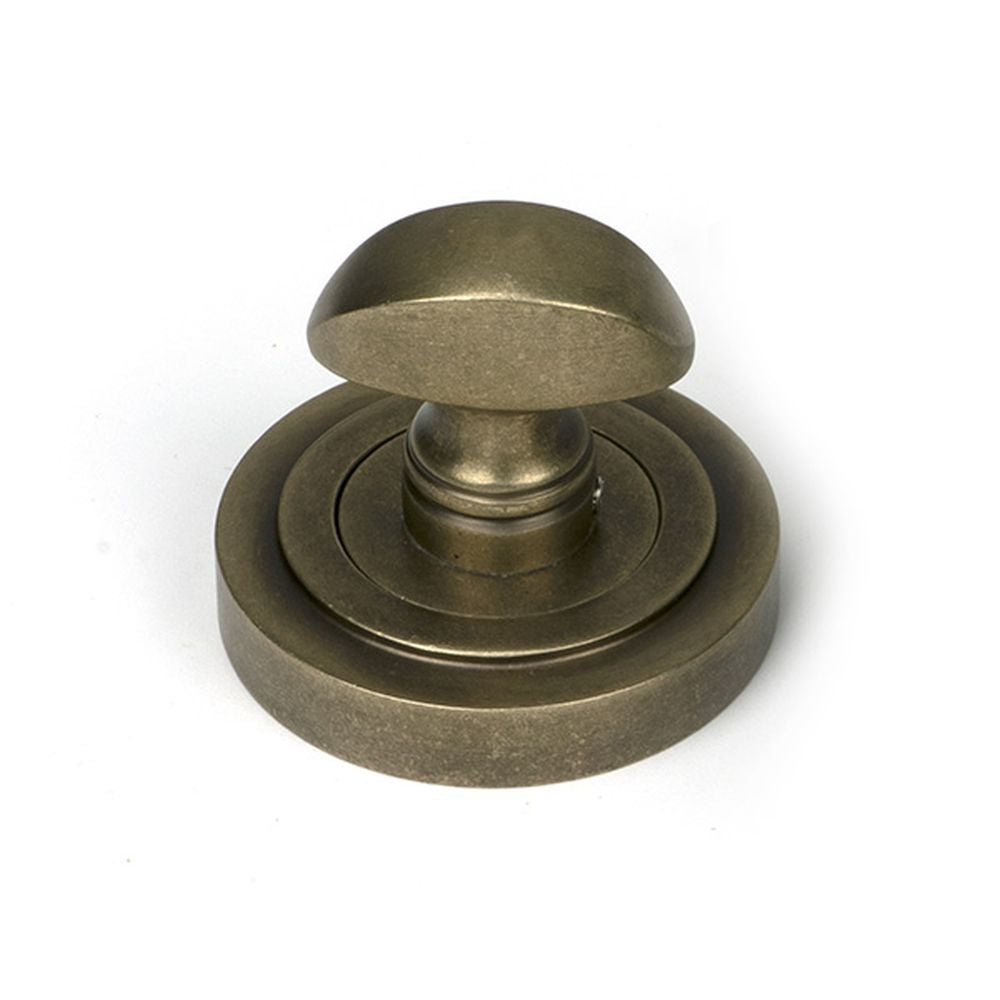 High quality images of the From The Anvil - Burnished Brass Round Thumbturn Set (Art Deco) | Sku. Anvil-52465 | available to order from Trade Door Handles, quick delivery at discounted prices.