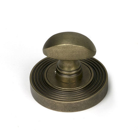 High quality images of the From The Anvil - Burnished Brass Round Thumbturn Set (Beehive) | Sku. Anvil-52466 | available to order from Trade Door Handles, quick delivery at discounted prices.