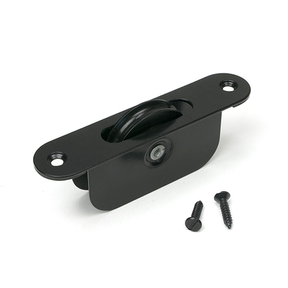 High quality images of the From The Anvil - Black Radiused Sash Pulley 75kg | Sku. Anvil-52481 | available to order from Trade Door Handles, quick delivery at discounted prices.