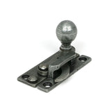 High quality images of the From The Anvil - Pewter Sash Hook Fastener | Sku. Anvil-52486 | available to order from Trade Door Handles, quick delivery at discounted prices.
